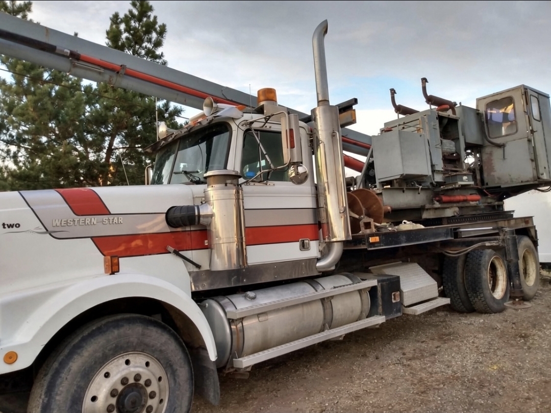 Western Star boom truck with crane rig on a jobsite near Edmonton